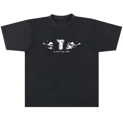 Black t-shirt with white graphic design featuring abstract shapes and text on the front