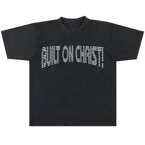 Black oversized t-shirt with white pixelated text graphic on chest reading PUT THEM FIRST