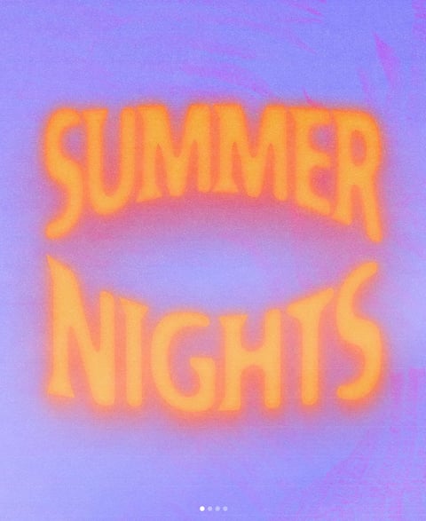 Glowing yellow neon sign reading Summer Nights on a purple background