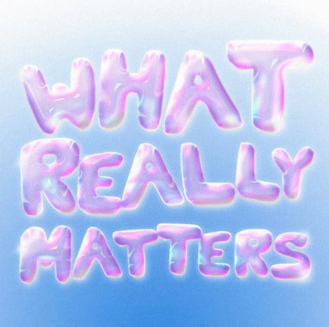 Glossy pink 3D text reading WHAT REALLY MATTERS on a blue gradient background