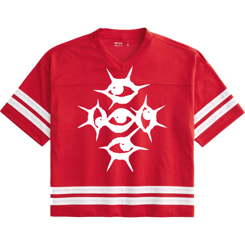 Red v-neck sports jersey with white star and fish graphic design and striped sleeves