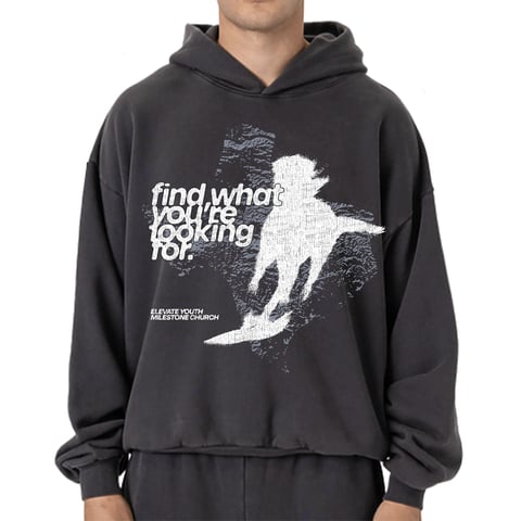 Black hoodie with white graphic design of a bird and text reading find what youre looking for